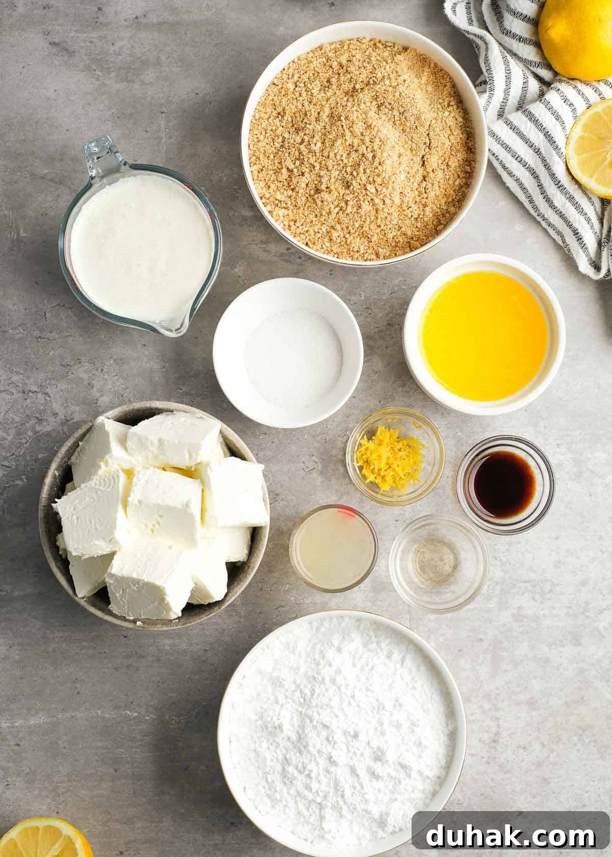 Lemon Cheesecake Recipe with Zesty Citrus Cream Filling 3 all ingredients needed for a no-bake lemon cheesecake on a countertop