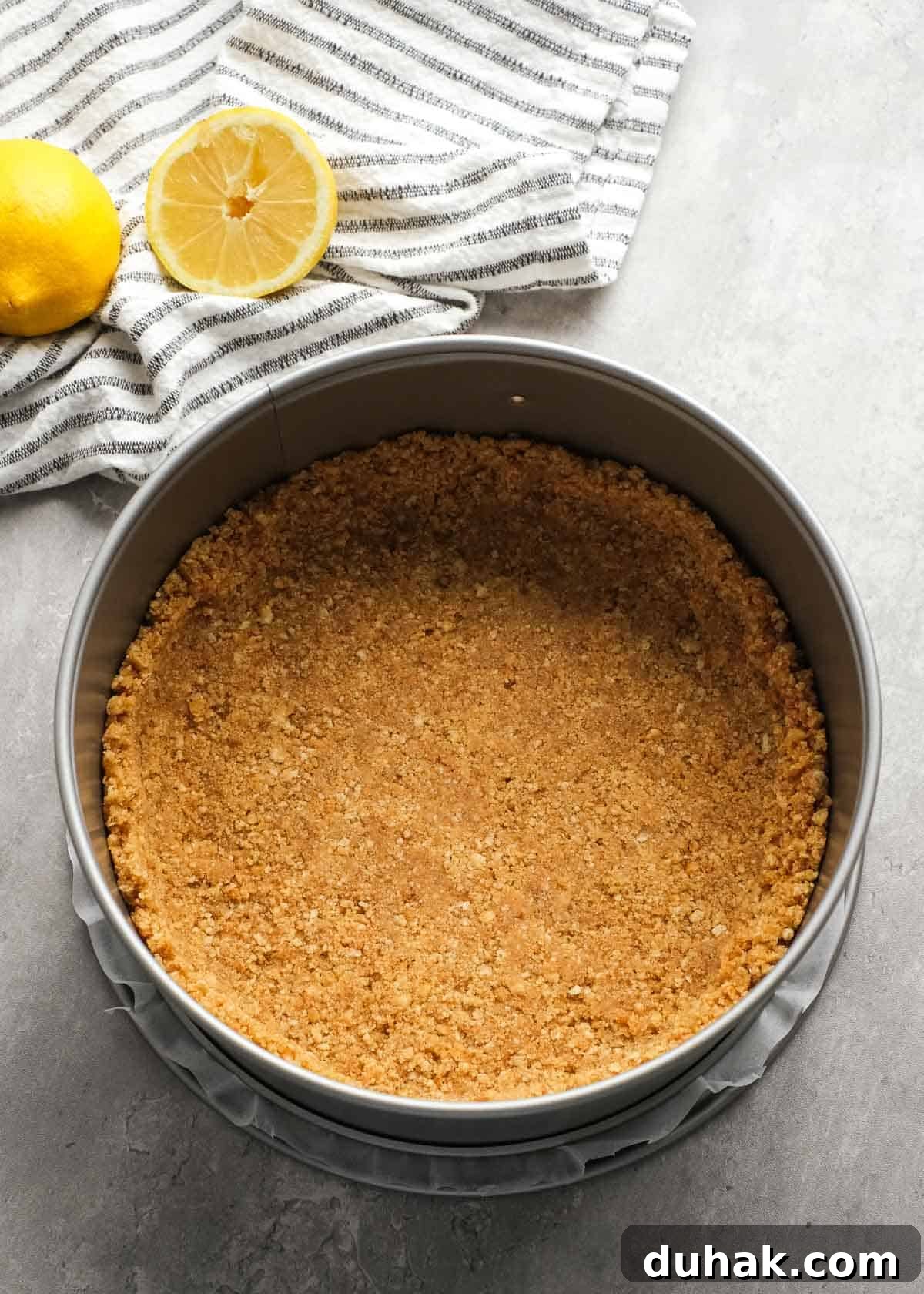 Lemon Cheesecake Recipe with Zesty Citrus Cream Filling 9 graham cracker crust pressed into a springform pan