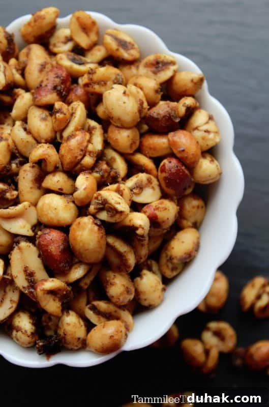 Spicy Crock-Pot Chili with Nuts: Slow Cooker Recipe 4 Chili nuts in a white bowl on a dark background