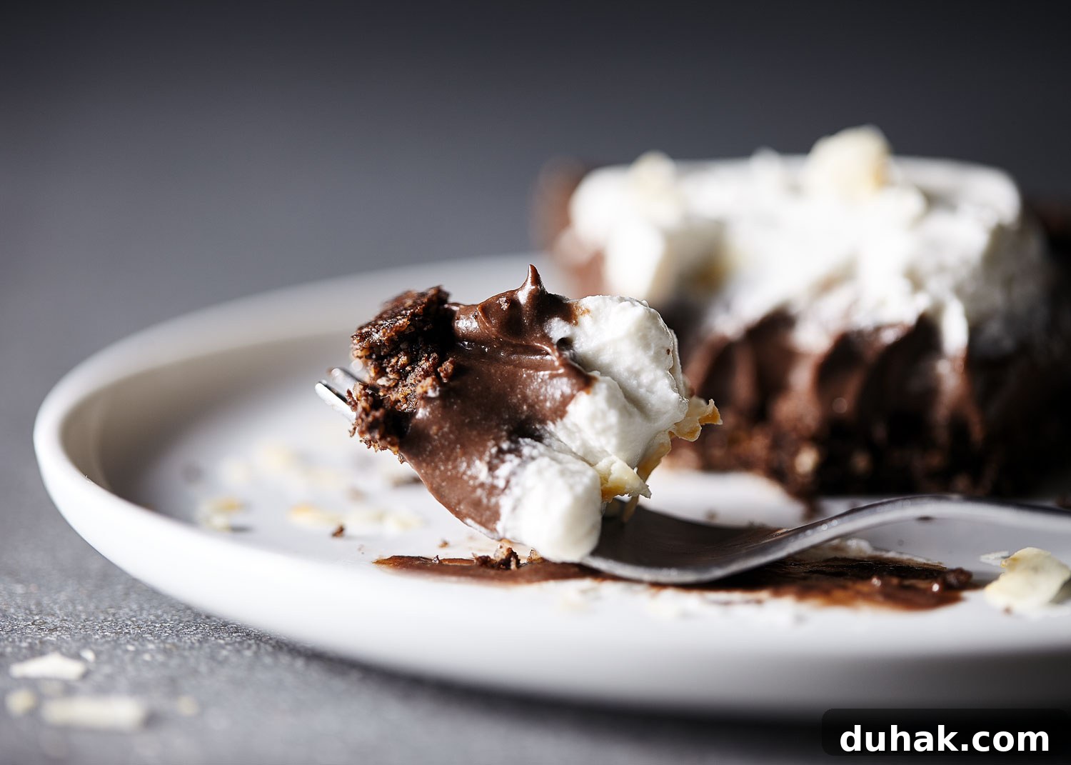 Chocolate coconut cream pie on a fork