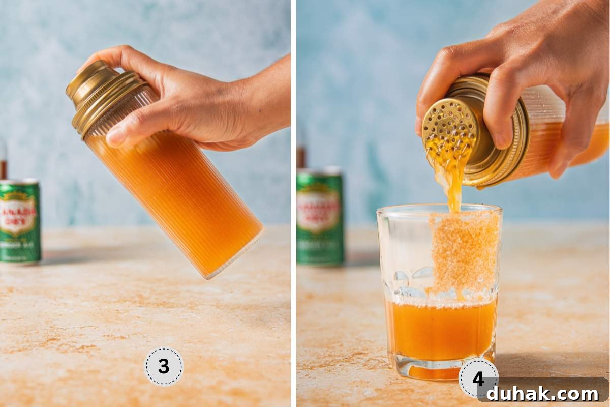 Shaking the ingredients in a shaker with ice, then straining into a glass. 