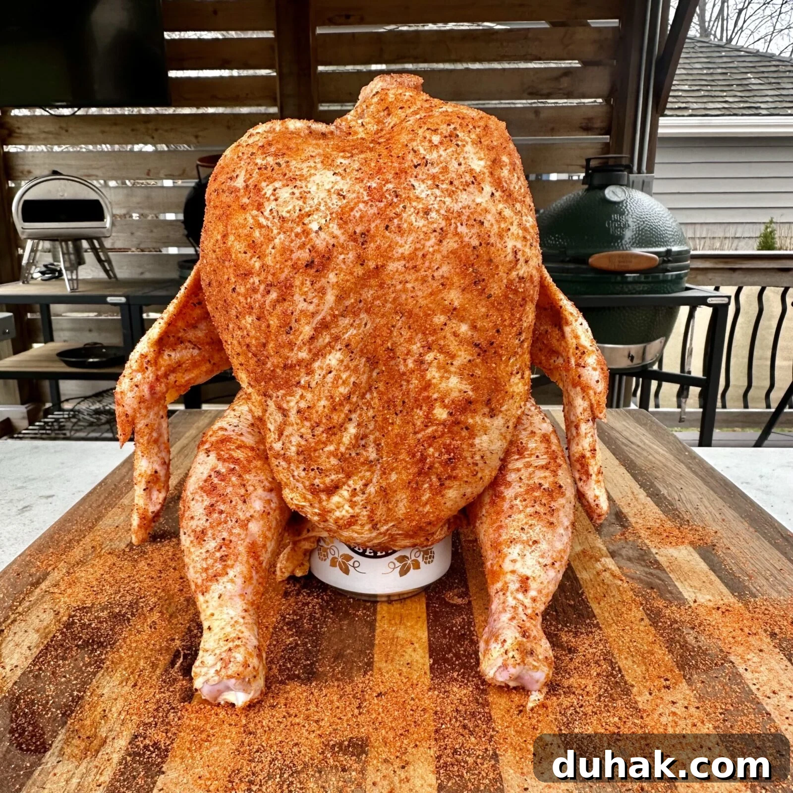 Smoked Beer-Can Chicken Recipe for Juicy, Crispy Skin 3 Seasoned whole chicken on beer can
