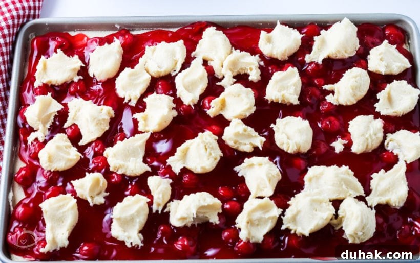 Glazed Cherry Bars: Simple Sweet Dessert Bars Recipe 5 Pan of unbaked Cherry Pie Bars | A Reinvented Mom