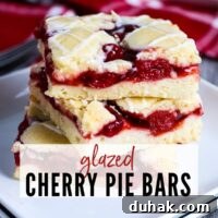 Three dessert bars on a white plate with Glazed Cherry Pie Bars graphic | A Reinvented Mom