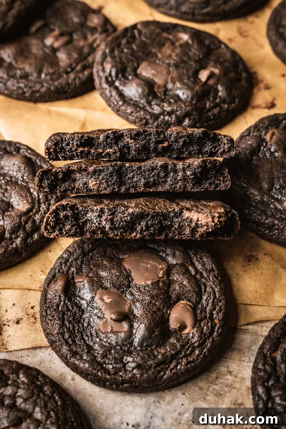 Double Cocoa Chocolate Cookies: Rich, Soft Baked Treats 16 A stack of three cookie halves that reveal the fudgy chocolate centers.