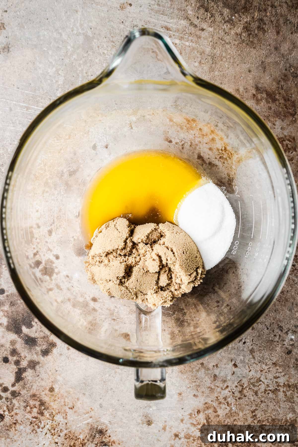 Double Cocoa Chocolate Cookies: Rich, Soft Baked Treats 6 Melted butter, brown sugar and granulated sugar in a mixing bowl.