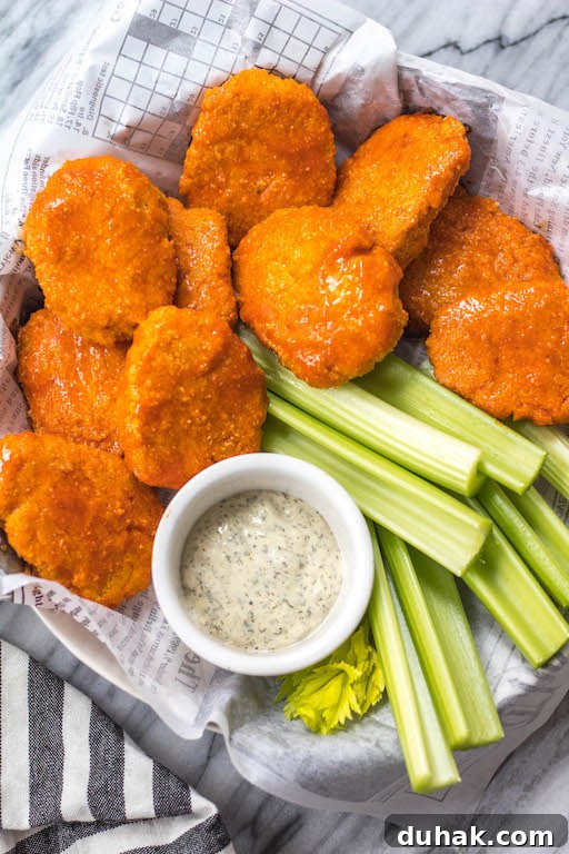 Buffalo chicken nuggets served on a platter