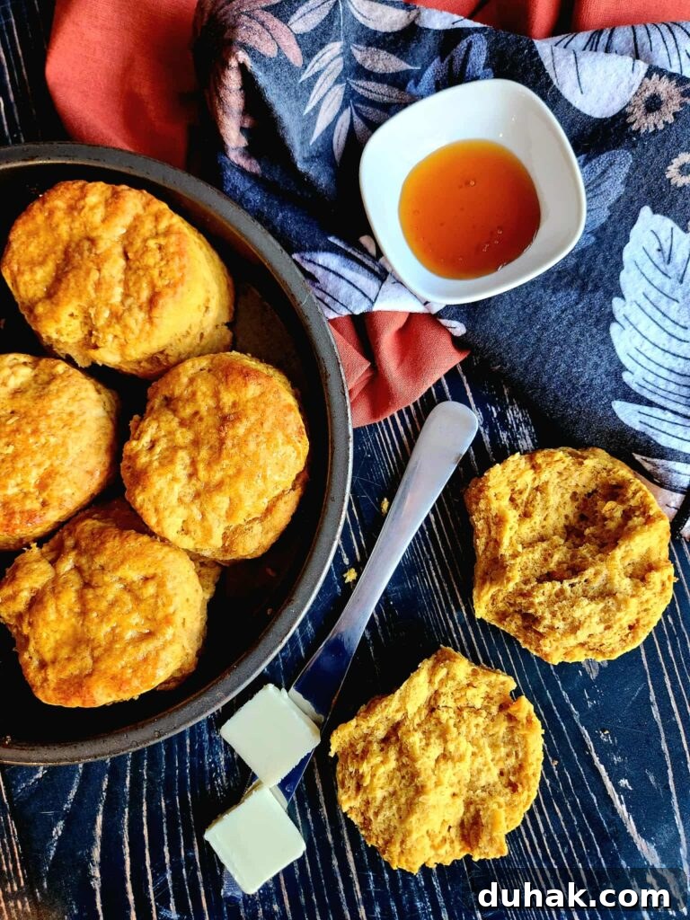 Southern-style Sweet Potato Buttermilk Biscuits brushed with warm honey butter. Flaky, easy, and perfect for Thanksgiving, brunch, or any cozy fall gathering.