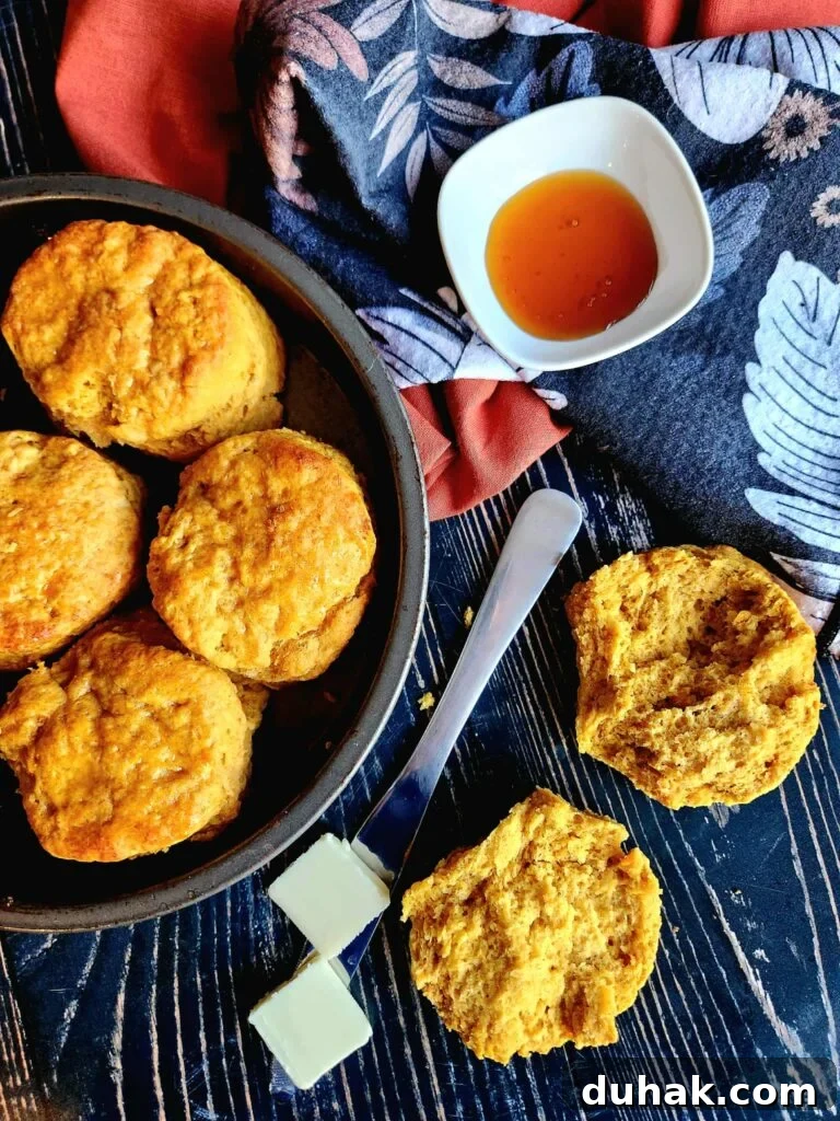 Southern-style Sweet Potato Buttermilk Biscuits brushed with warm honey butter. Flaky, easy, and perfect for Thanksgiving, brunch, or any cozy fall gathering.