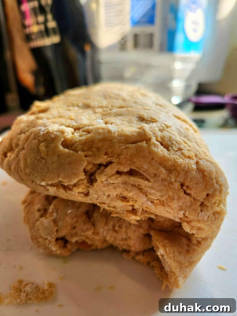 folding biscuit dough to create layers