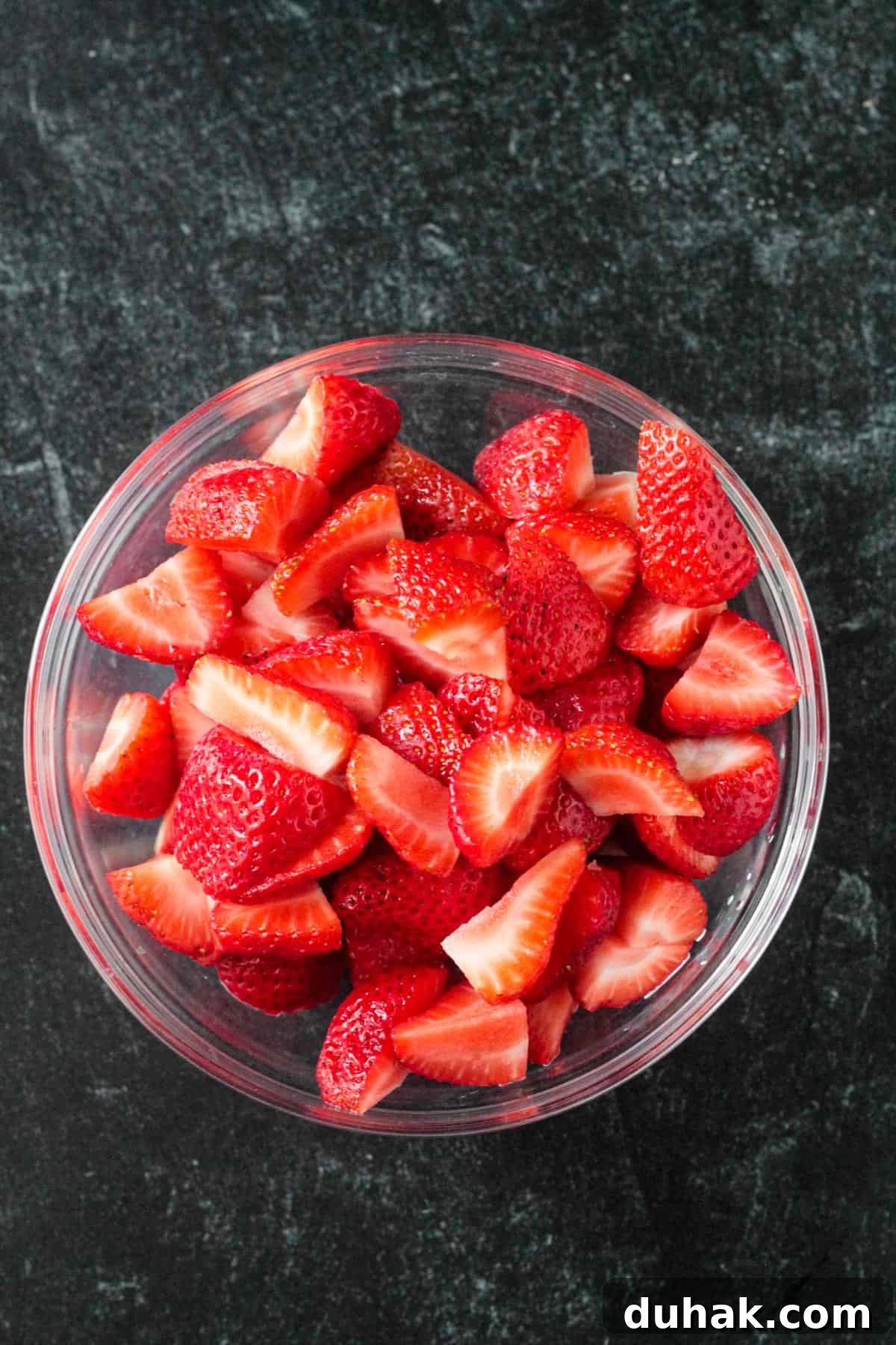 Vanilla Cornbread Cake Recipe: Moist, Sweet Corn Cake 5 Bowl of sliced strawberries.