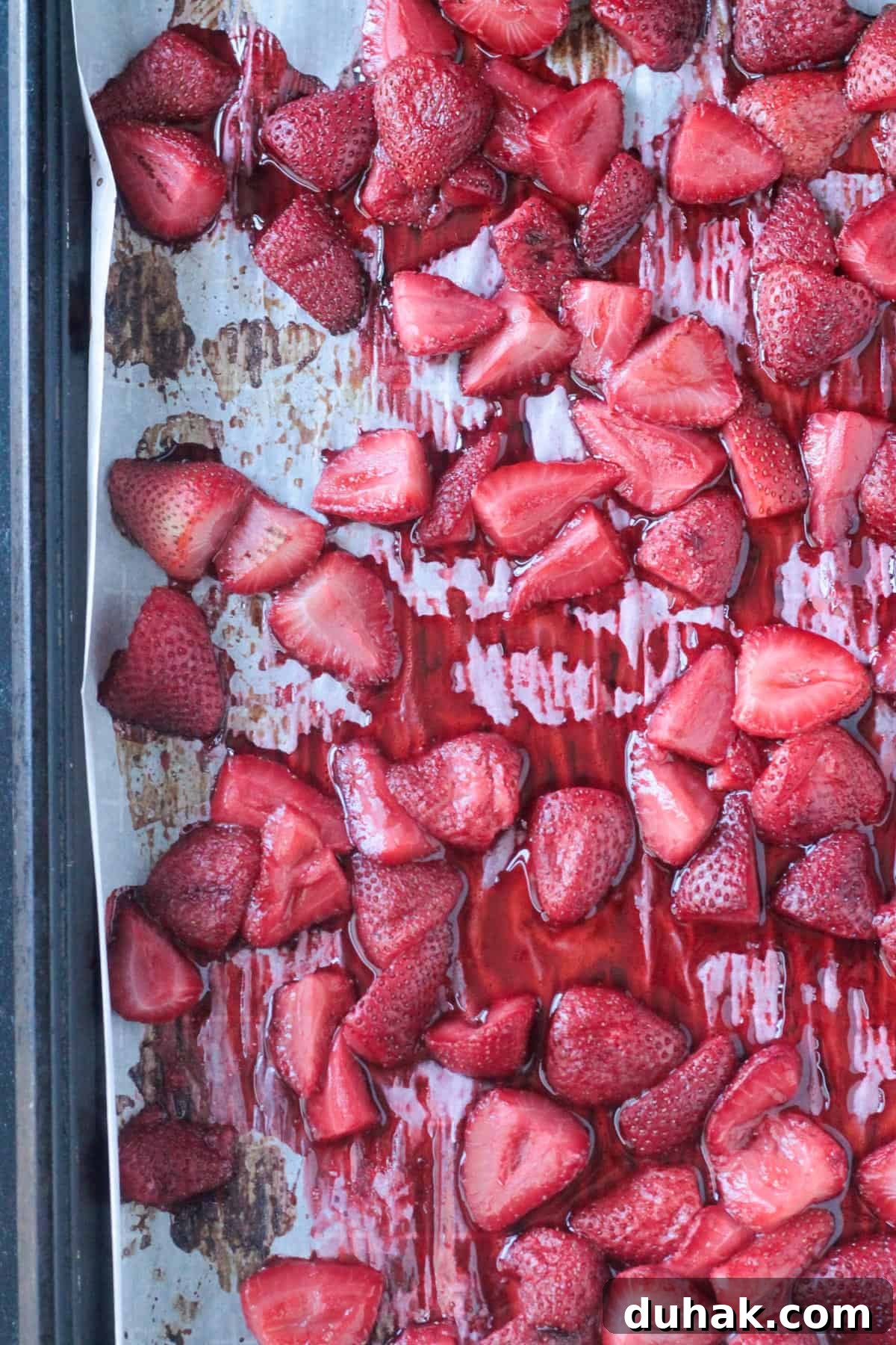 Vanilla Cornbread Cake Recipe: Moist, Sweet Corn Cake 6 Close up of jammy roasted strawberries.