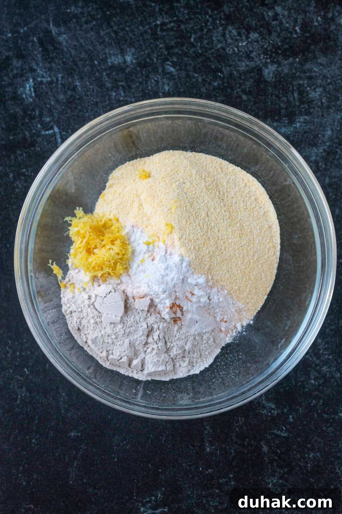 Vanilla Cornbread Cake Recipe: Moist, Sweet Corn Cake 4 Dry ingredients in a mixing bowl.