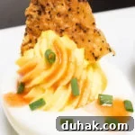 Deviled Eggs with Fried Chicken Skin & Hot Sauce