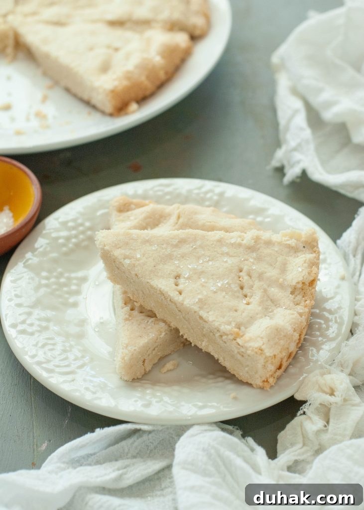 gluten-free-shortbread-wedge-cookies-two-stacked-on-white-plate